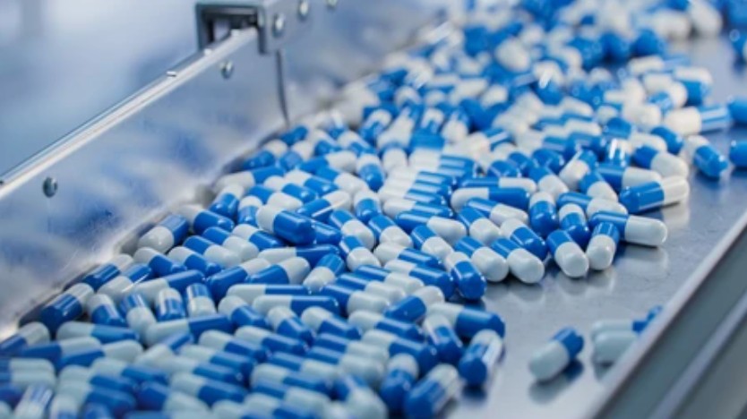 Encapsulated supplements moving along an automated production line