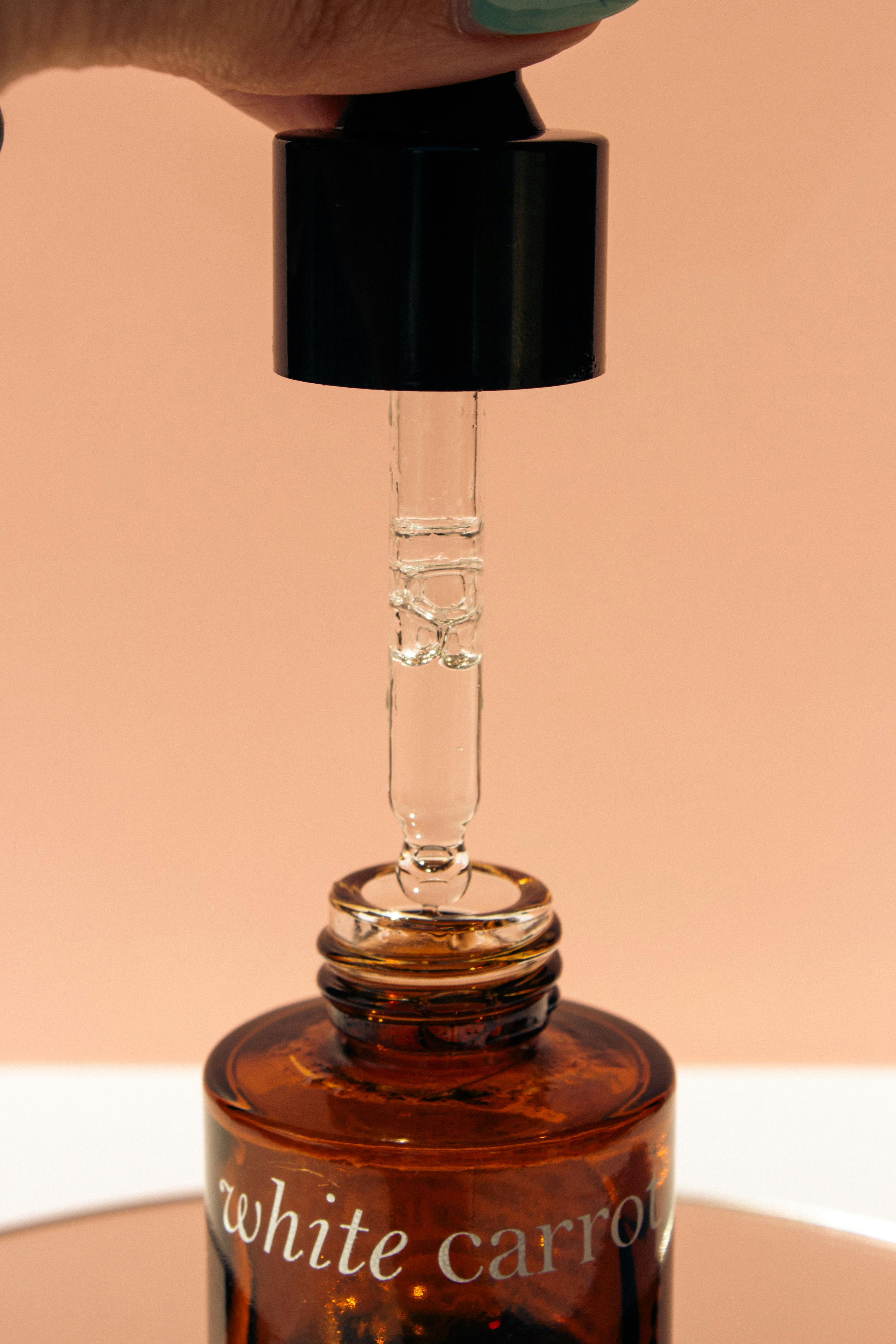 Close-up of a finished PureWilde serum and dropper